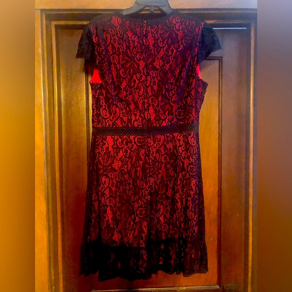 Black and red lace knee length dress.